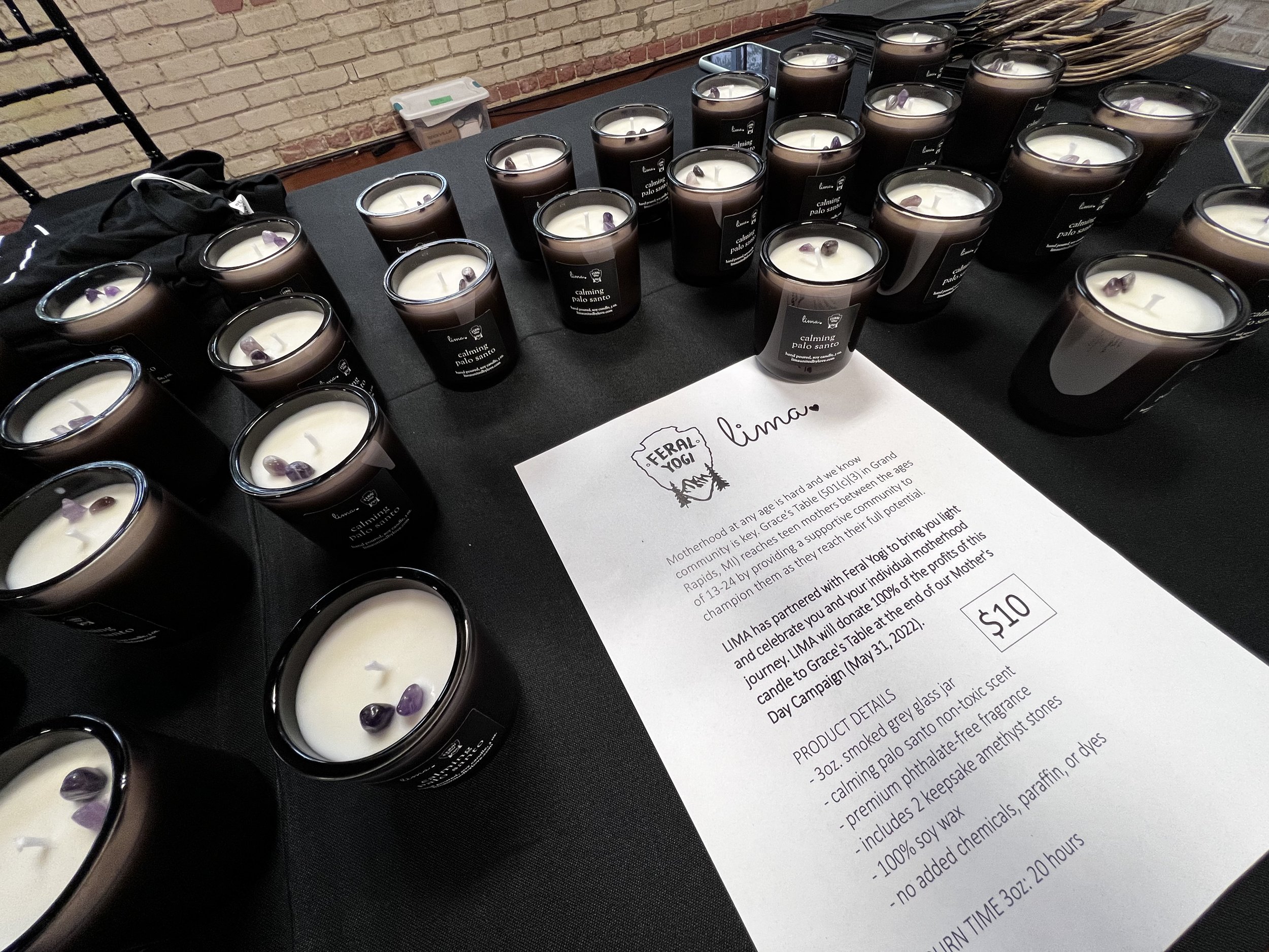 Special edition Lima United by Love Candles on a table at the event.